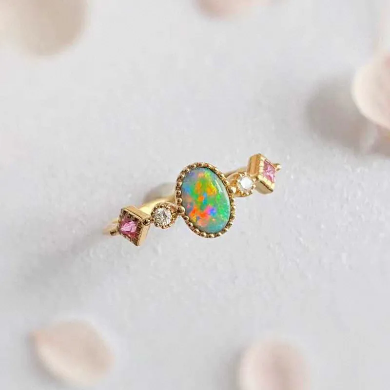 18K Gold 0.08ct Oval Cut Natural Opal Gemstone Ring