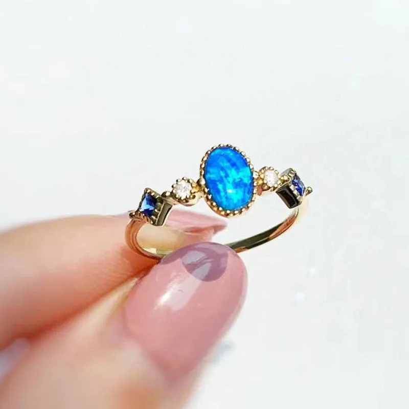 18K Gold 0.08ct Oval Cut Natural Opal Gemstone Ring