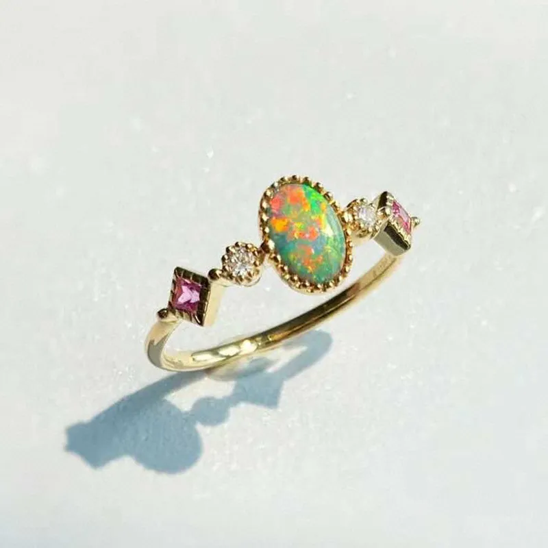 18K Gold 0.08ct Oval Cut Natural Opal Gemstone Ring