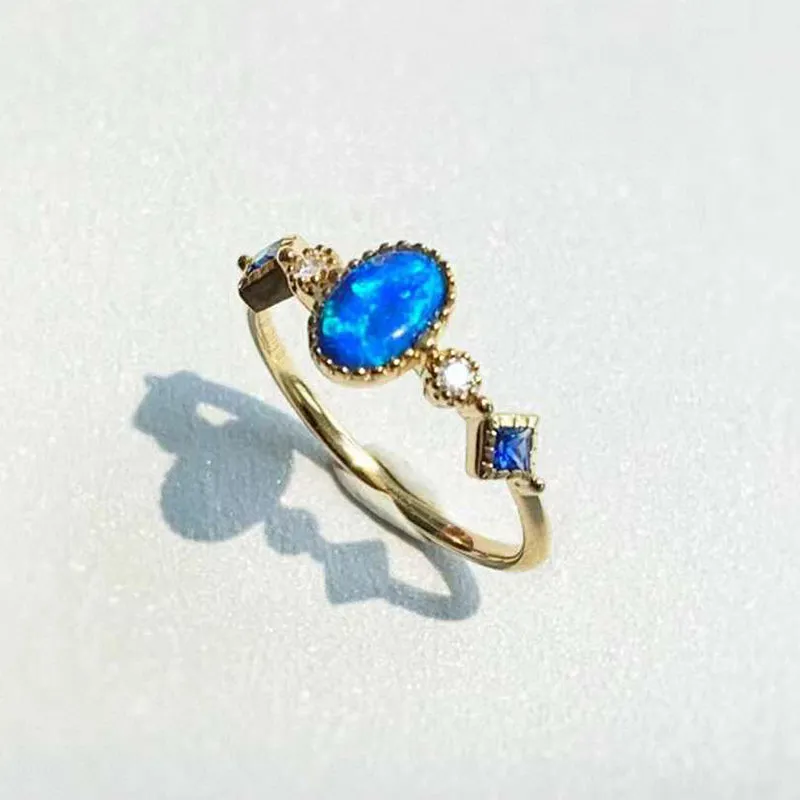 18K Gold 0.08ct Oval Cut Natural Opal Gemstone Ring