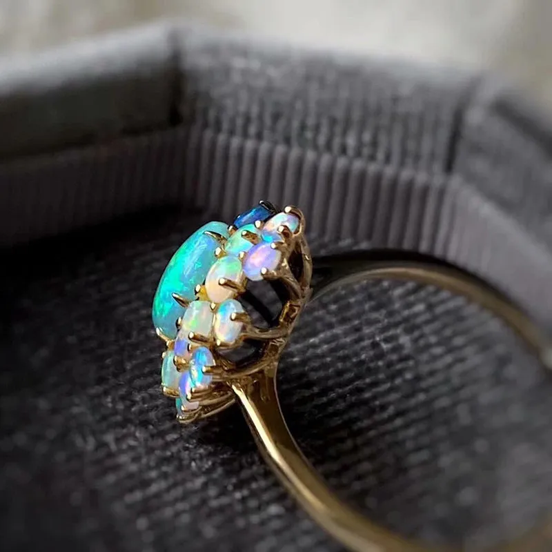 18K Gold Oval Cut Natural Opal 0.95ct  Halo Stone Ring