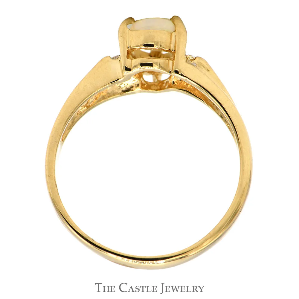 Pear Cut Opal ring with Diamond Accented Sides in 14k Yellow Gold